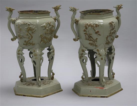 A pair of cast iron chinoiserie vases
